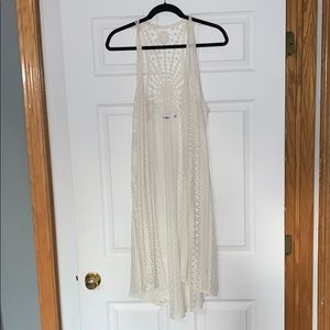 Cream sleeveless cover top